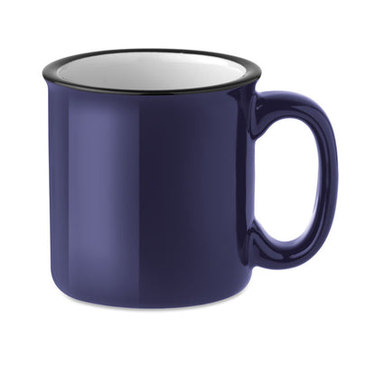 Mug azul de cerámica con borde negro e interior blanco
