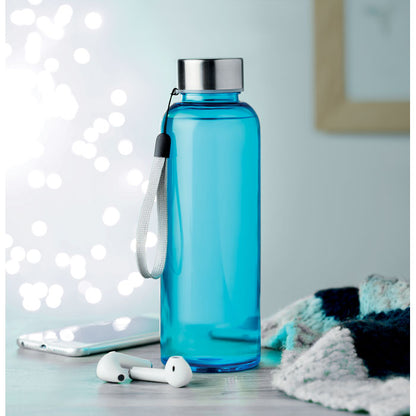  Botella azul de Tritán Con auriculares y móvil sobre mesa