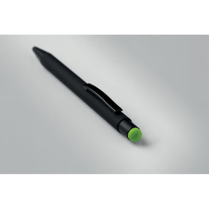 Boli negro con puntero verde tumbado sobre superficie gris neutra