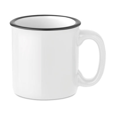 Taza vintage de cerámica blanca con borde negro