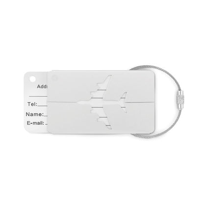 Identificador de maleta de aluminio gris con figura de avión en la parte superior y etiqueta para rellenar datos personales