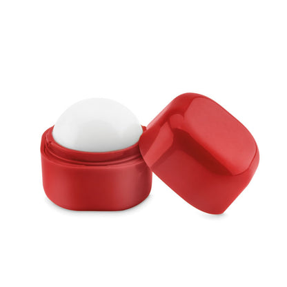 Cajita con cacao labial abierto con tapa rojo