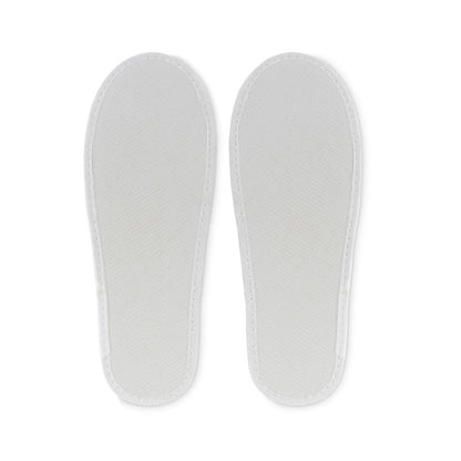 Suela blanca de zapatillas de viaje blancas
