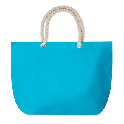 Bolsa turquesa de playa con asas beige de cordón