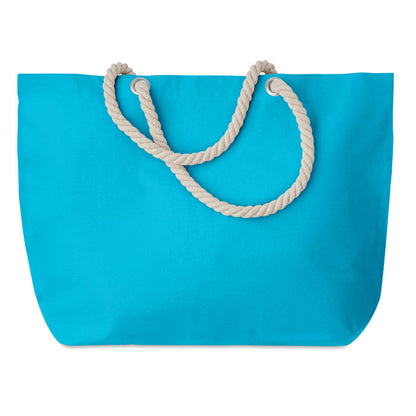Bolsa turquesa de playa con asas beige de cordón