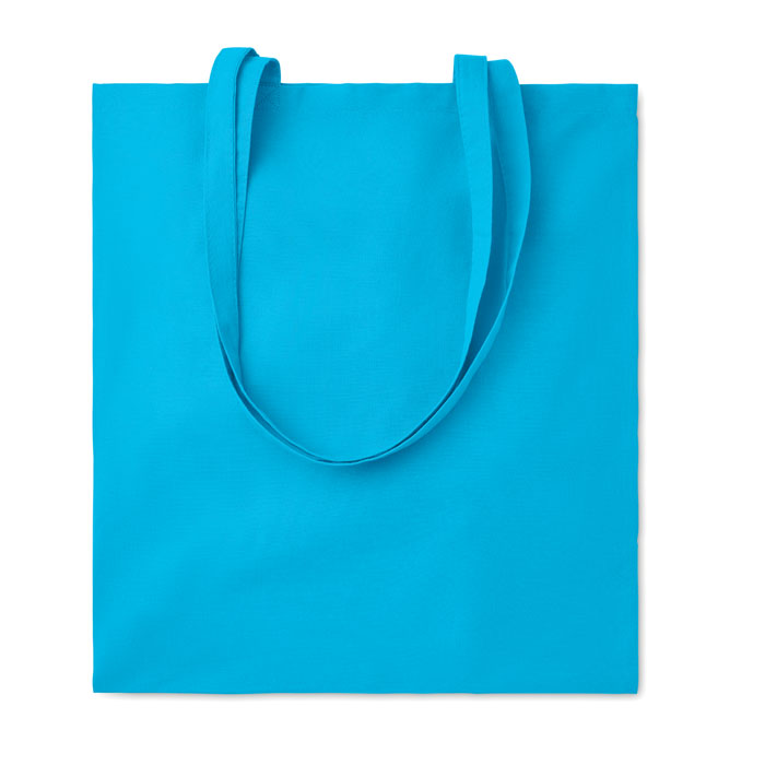 Bolsa de algodón turquesa de 180 gr/m² con asas largas y forma cuadrada, vista frontal.