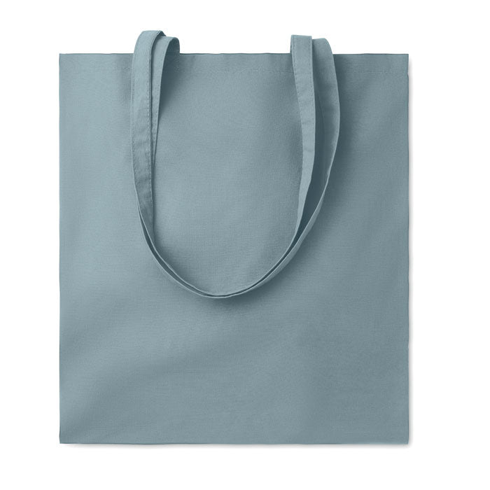 Bolsa de algodón color petroleo con asas largas, diseño simple y acabado liso.