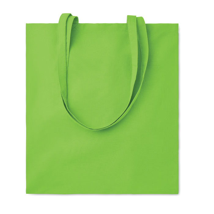 Bolsa de algodón color lima con asas largas, material de 180 gr/m², vista frontal.