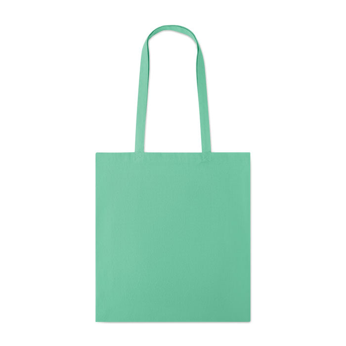 Bolsa de algodón de color verde menta con asas largas y diseño rectangular.