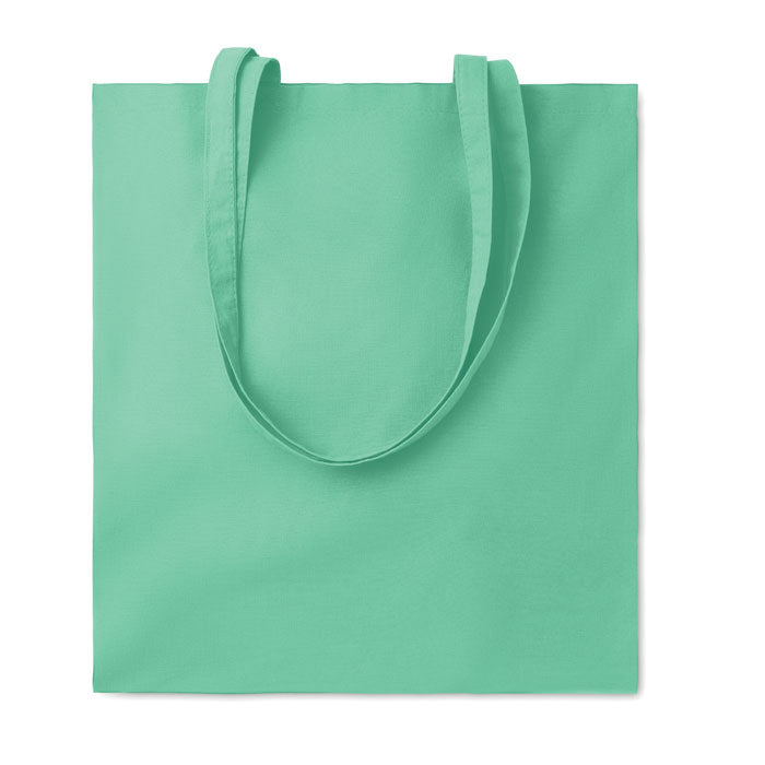 Bolsa de algodón verde menta con asas largas, fabricada en material de 180 gr/m².