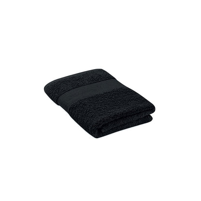 Toalla de rizo de algodón negro con cenefa doblada