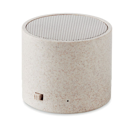 Altavoz inalámbrico cilíndrico de paja de trigo color beige con interruptor de encendido